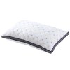 White pillow with quilted design