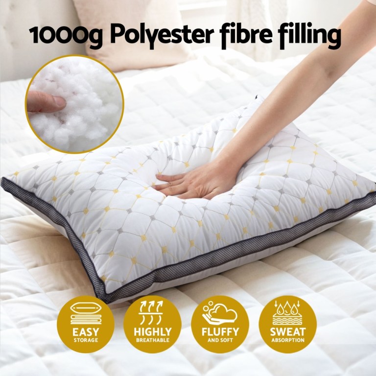 Hand pressing soft polyester fibre pillow.