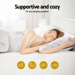 Woman sleeping on supportive, adjustable pillow