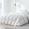 quilt dfd 95 k 202502281410 00.jpg Cosy white bed with fluffy pillows and bedding.