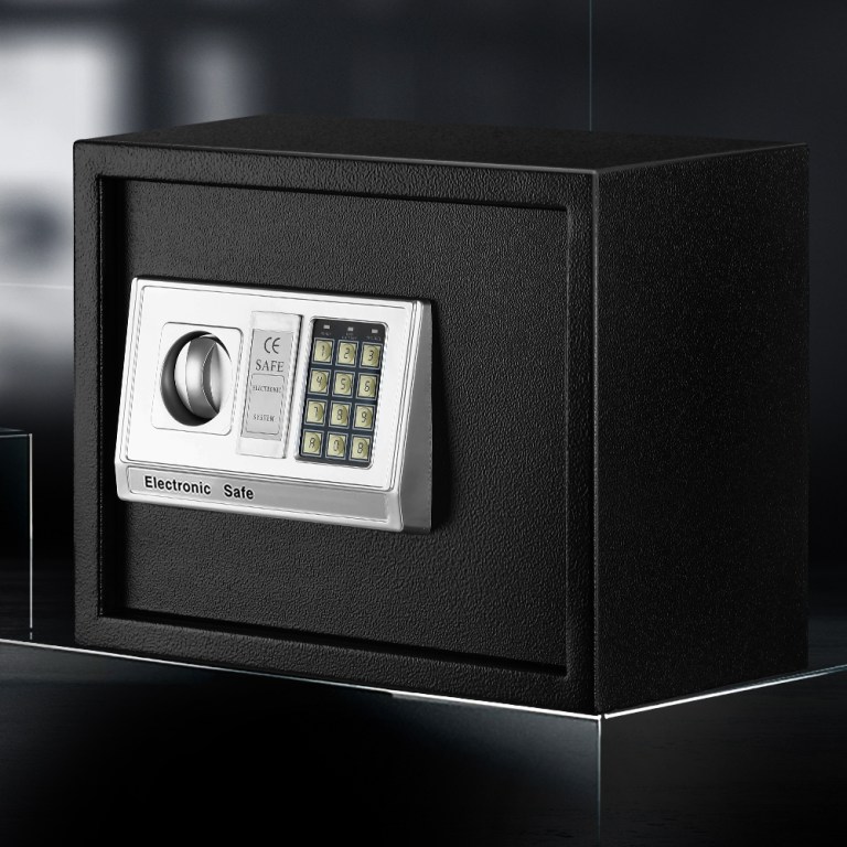 Black electronic safe with keypad and handle.