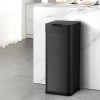 Sleek black bin in modern kitchen setup.