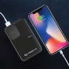 Smartphone charging with power bank, 5000mAh capacity.