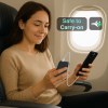 Woman using power bank on airplane.
