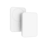 laser 5000mah magnetic wireless power bank white Wireless magnetic phone charger on white background.