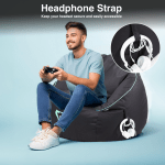 laser gaming bean bag with pocket & headphone strap Man gaming, beanbag with headphone strap.
