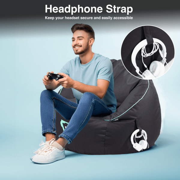 Man gaming, beanbag with headphone strap.