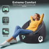 Person relaxing on bean bag for gaming and movies.