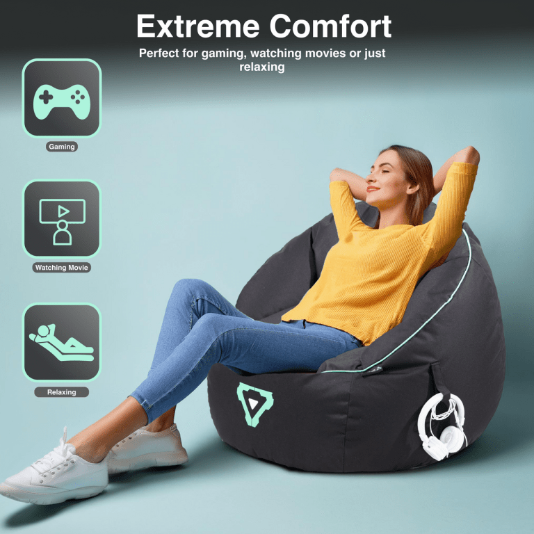 laser gaming bean bag with pocket & headphone strap Person relaxing on bean bag for gaming and movies.