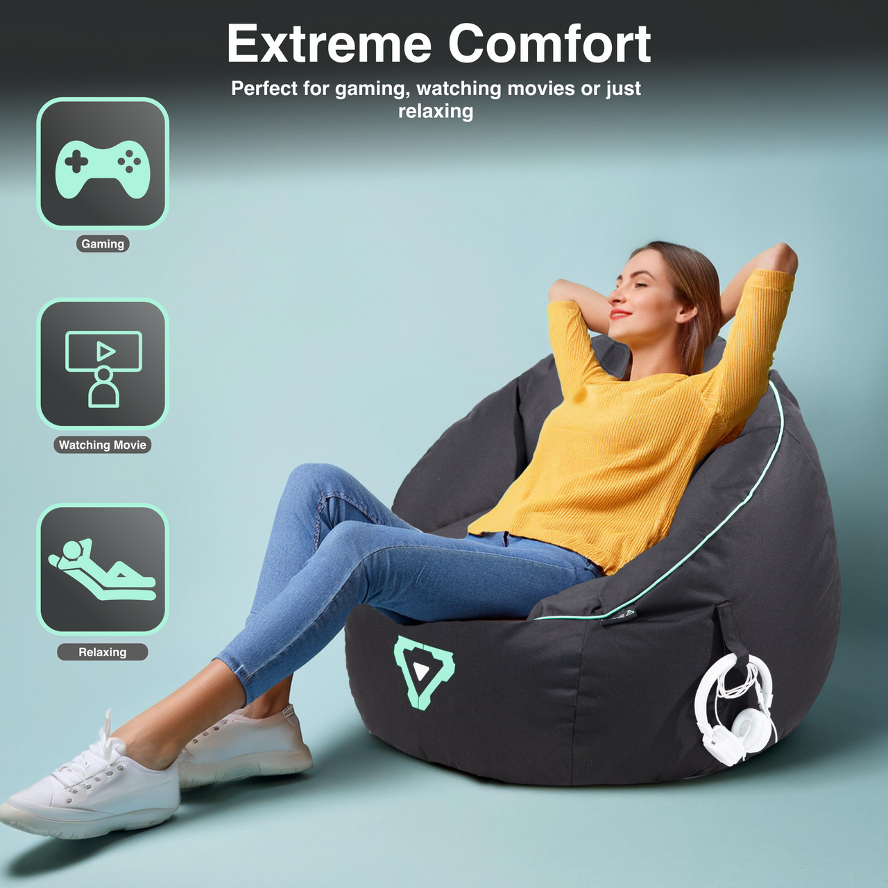 Person relaxing on bean bag for gaming and movies.