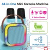 laser mini karaoke speaker with 2 wireless mics blue Mini Karaoke Machine with microphones and colourful speaker.