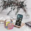 Bluetooth speaker and phone playing music.