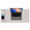 v1031 wc matg 808 202507251017 00.jpg Laptop, phone, earbuds on charging mat.