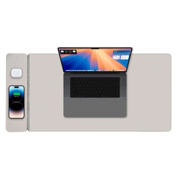 v1031 wc matg 808 202507251017 00.jpg Laptop, phone, earbuds on charging mat.