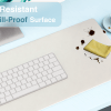 laser wireless charging desk mat grey Water-resistant, spill-proof desk mat with keyboard, coffee stain.