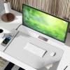 laser wireless charging desk mat grey Modern minimalist desk with computer and wireless charging.