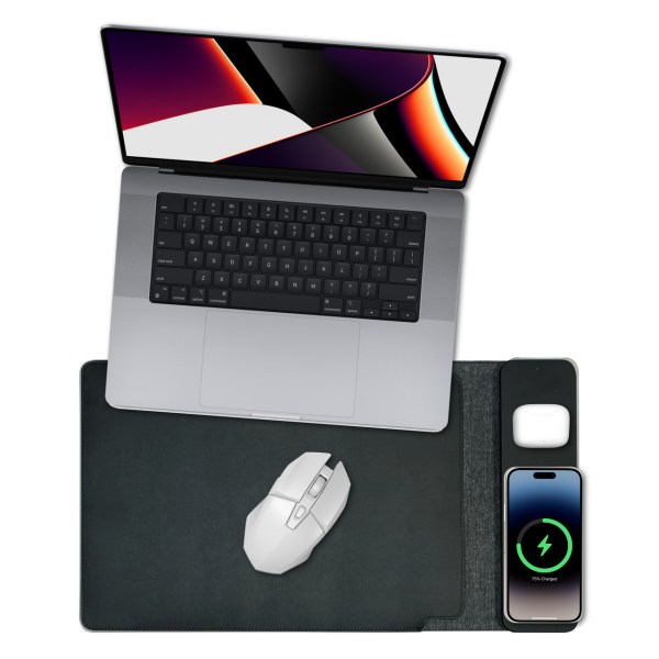 Laptop with mouse, phone, wireless earbuds on desk