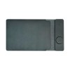Black wireless charging pad with leather finish.