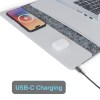 USB-C charging pad with phone and earbuds.