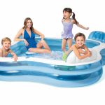 intex swim center family lounge pool 56475 Kids playing in inflatable pool with adult.