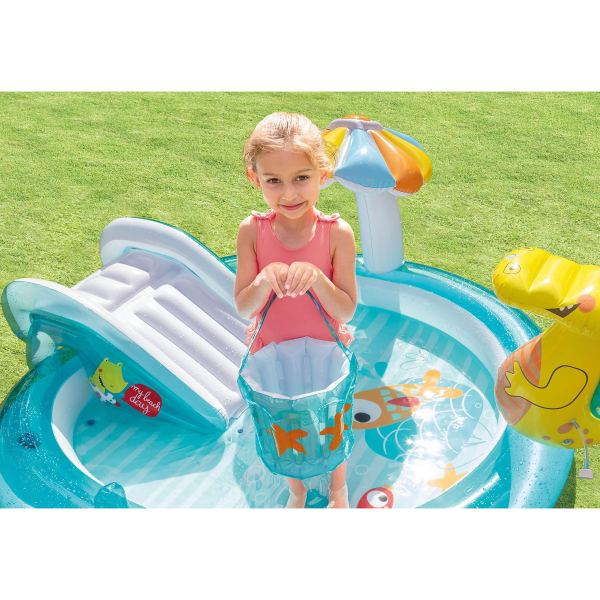 intex gator inflatable play centre 57165 Child playing in inflatable kiddie pool with bucket.