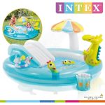 Inflatable kids pool with slide and sprinkler.