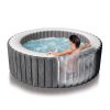 intex purespa 6 person greywood spa 28442 Person relaxing in an inflatable spa pool
