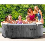 intex purespa 6 person greywood spa 28442 Group enjoying an inflatable hot tub outdoors.