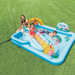 Children playing in inflatable backyard pool