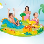 intex little dino inflatable play centre 57166 Children playing in inflatable dinosaur-themed pool.