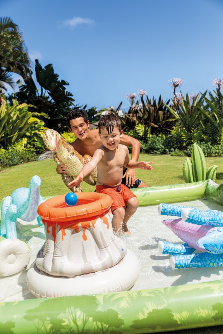 intex jurassic adventure inflatable play center 56132 Kids playing in inflatable dinosaur water pool.