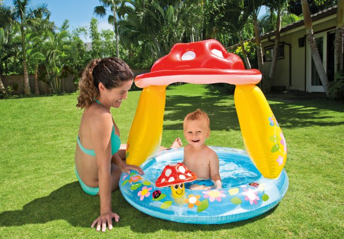 intex mushroom inflatable kiddie pool 57114 Mother and child enjoying inflatable pool outdoors.