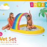 intex rainbow arch inflatable spray kiddie pool 57156 Child playing in inflatable rainbow splash pool