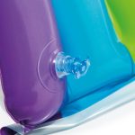 Close-up of colourful pool float valve.