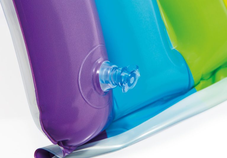 Close-up of colourful pool float valve.