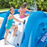intex kool splash inflatable water slide with spray 58849 Children play on inflatable water slide in pool.