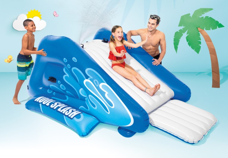intex kool splash inflatable water slide with spray 58849 Kids playing on inflatable water slide outdoors.
