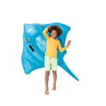 Child posing with blue inflatable stingray.