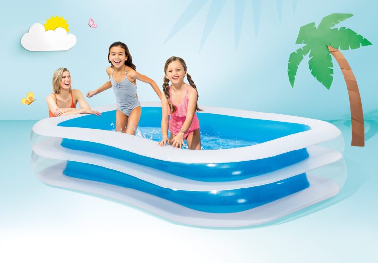 intex swim center family pool 56483 Kids playing in inflatable pool with parent watching.