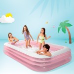 v1032 ixswimcentre 58487 p 202508201021 00.jpg Kids playing in inflatable pink swimming pool.