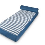 Blue and white striped mattress with headrest
