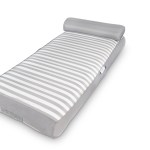 Grey striped mattress on white background