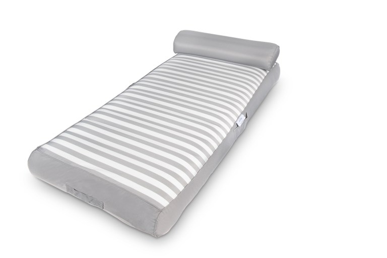 Grey striped mattress on white background