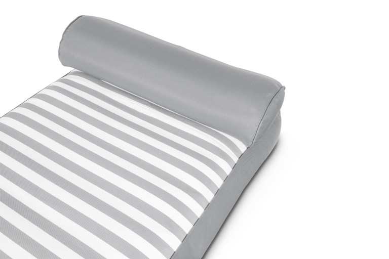 Grey and white striped outdoor cushion with headrest.