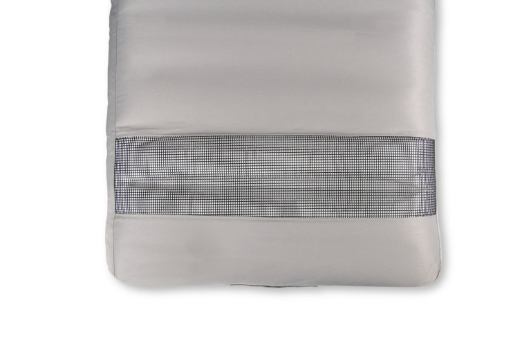 Grey cushioned mattress with mesh panel.
