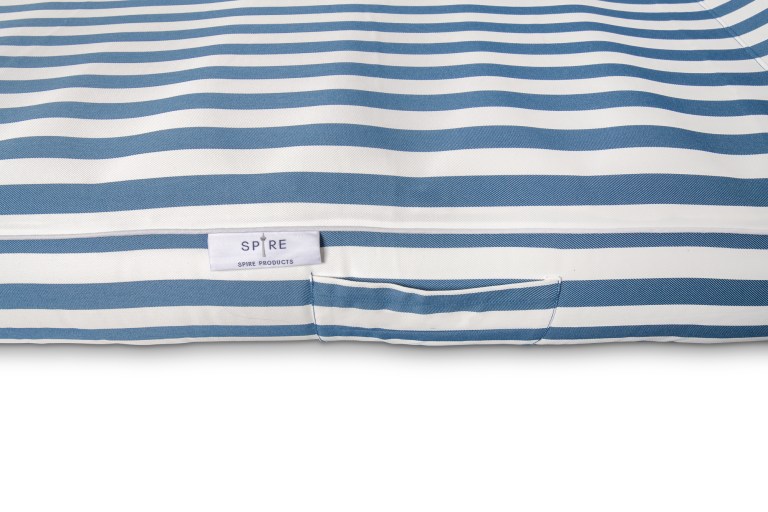 spire paradisus luxury pool lounge blue stripe rl 884b Blue and white striped pillow with Spire Products tag.