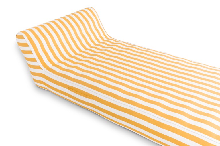 Yellow and white striped outdoor lounge chair.