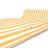 Yellow and white striped bed with headboard