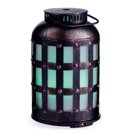Vintage lantern with green glowing light.