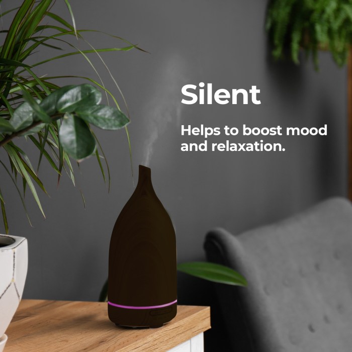 milano decor aroma diffuser 100ml ultrasonic humidifier purifier and 3 pack oils dark wood Aroma diffuser on table, enhancing mood and relaxation.